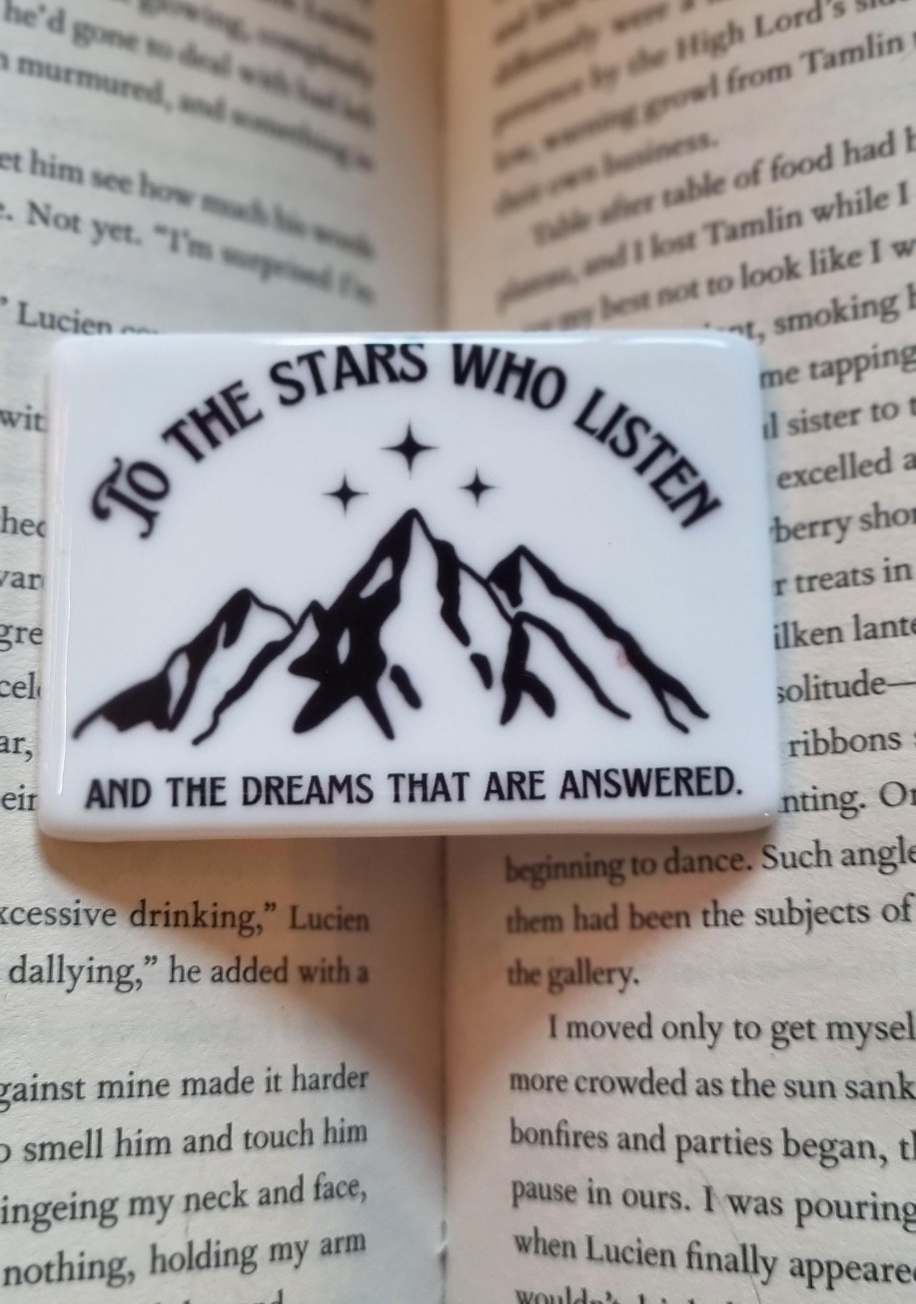 City of Starlight bookish magnet with mountain and star design on an open book page