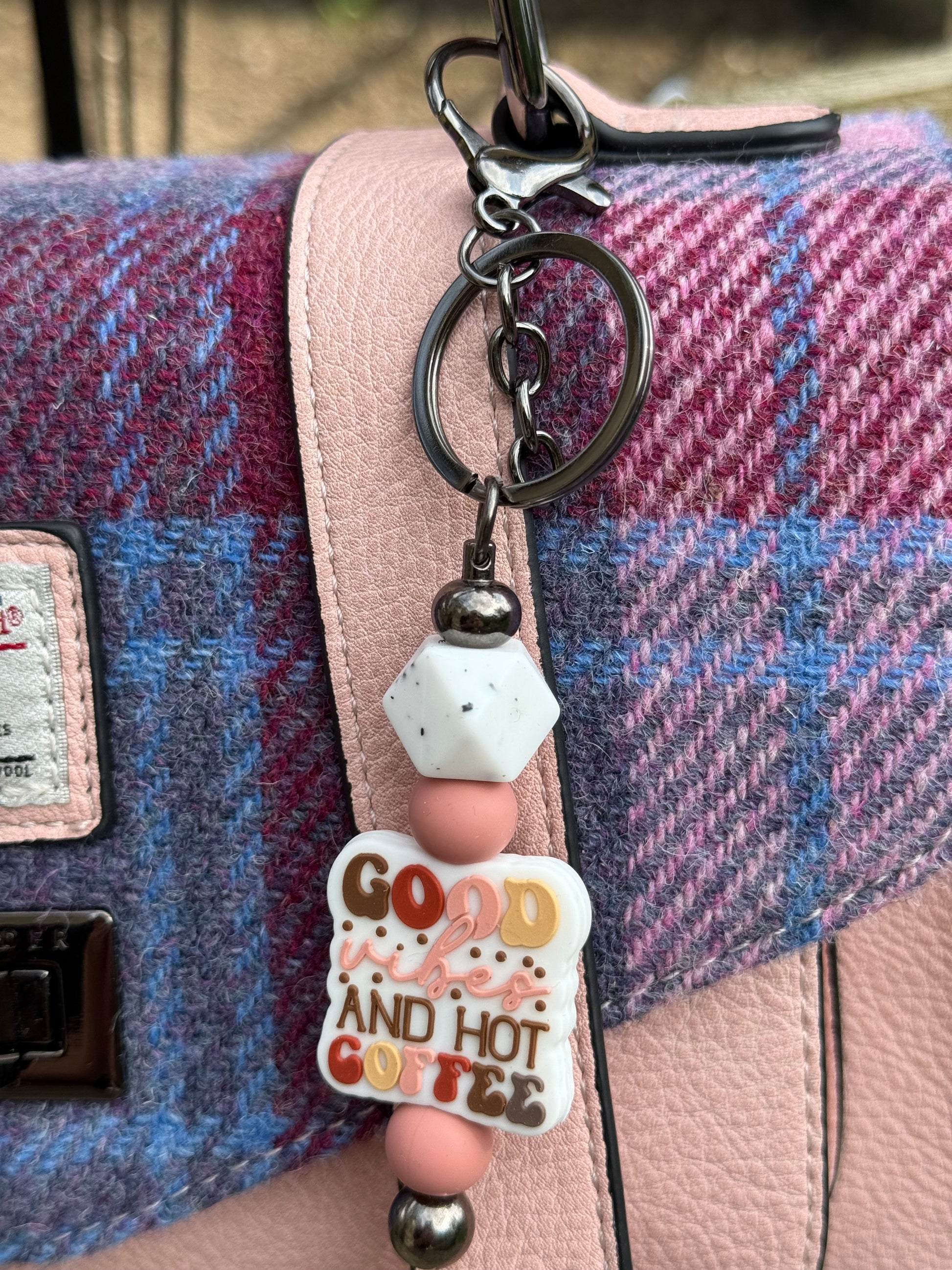 Cute coffee lover keyring with colourful beads and a quote charm hanging on handbag strap