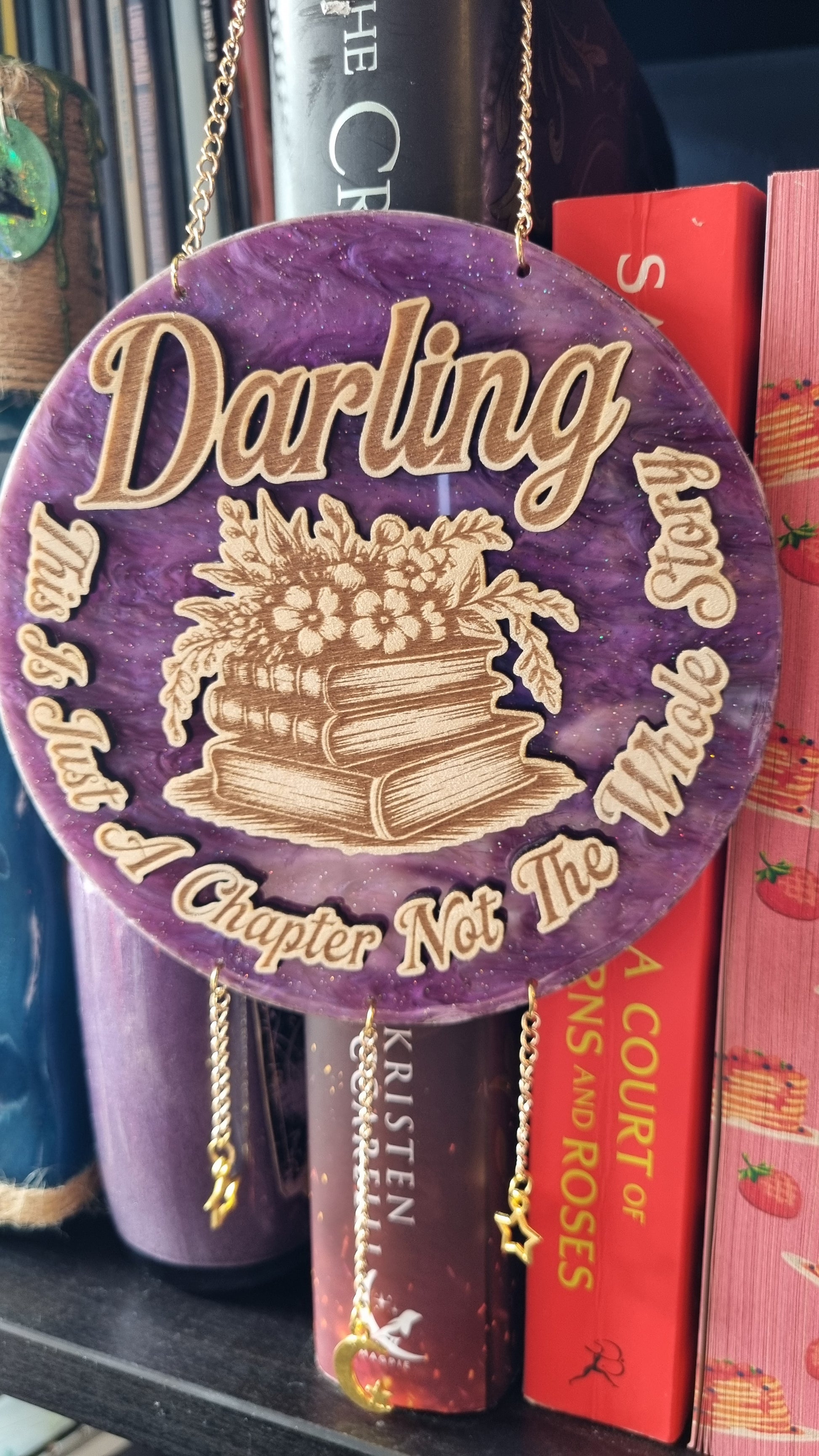 Sublimely Special just a chapter bookish ornament with Darling text and stacked books design on purple background