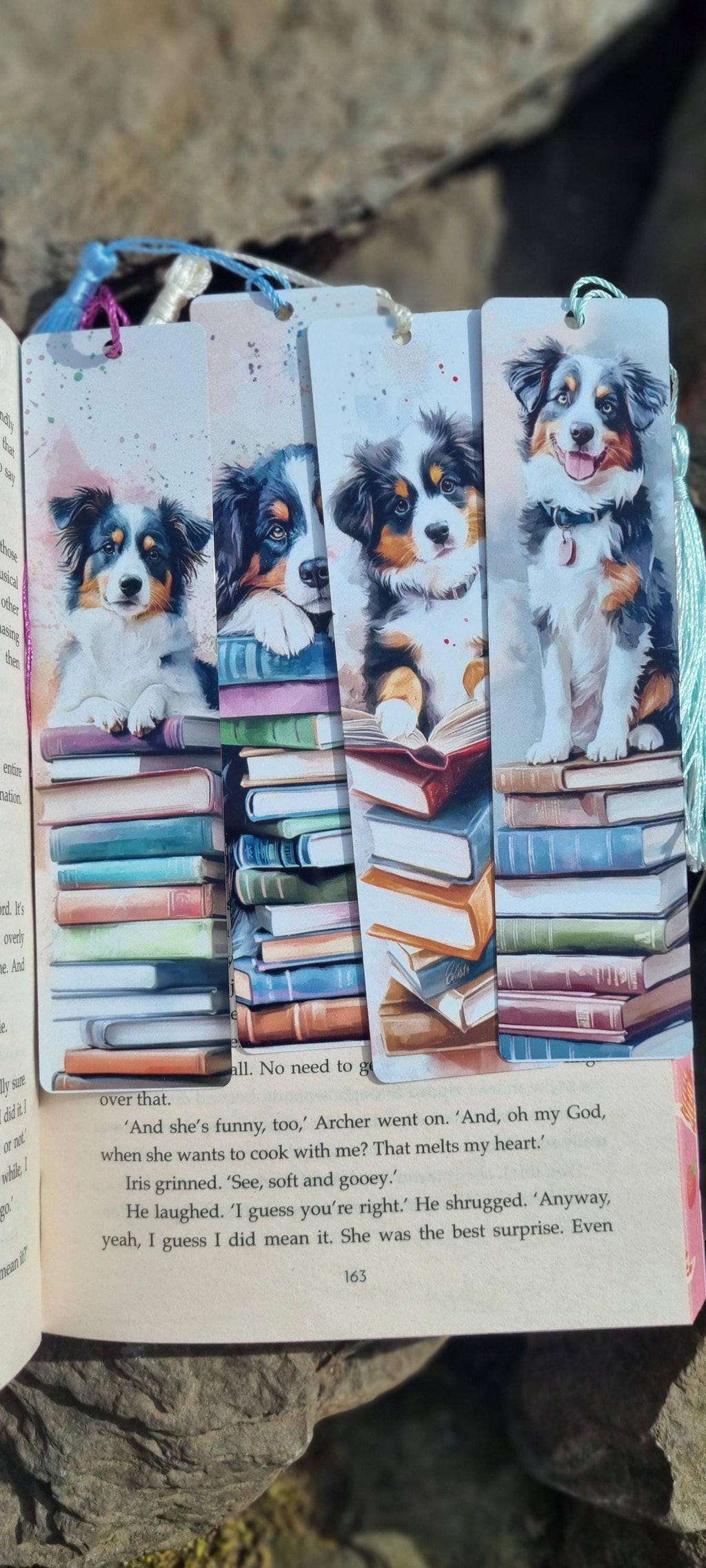 Set of four bookmarks with dog illustrations sitting on stacks of books perfect dog lover gifts for readers