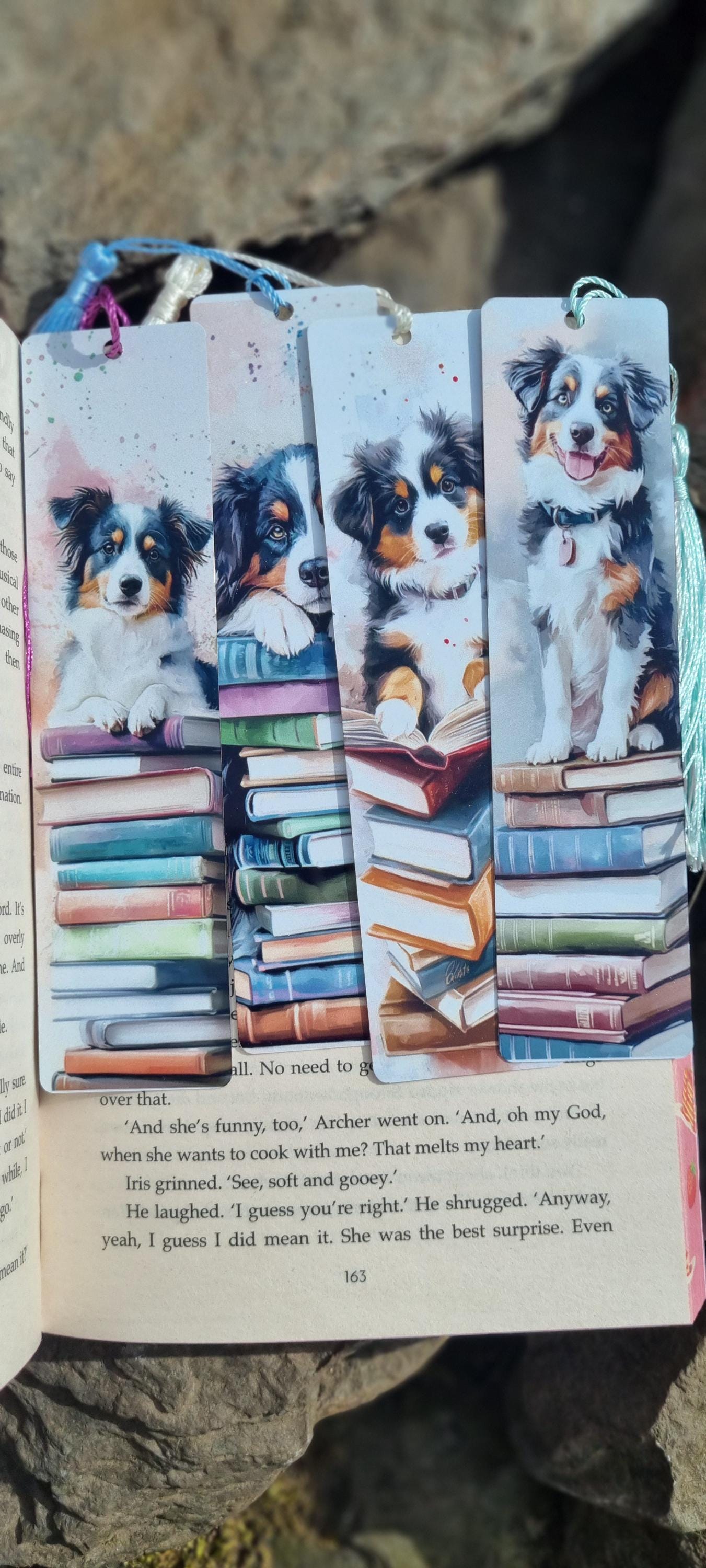 Set of four bookmarks with dog illustrations sitting on stacks of books perfect dog lover gifts for readers