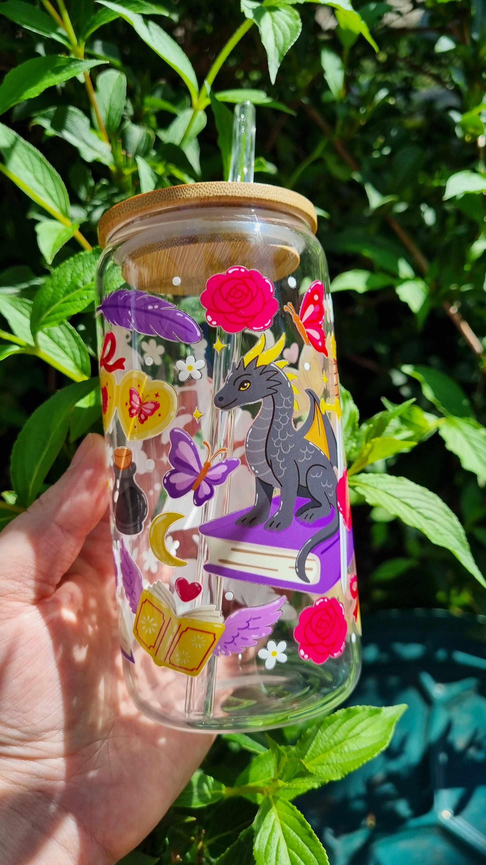 Dragon bookish glass tumbler with colourful dragon, roses, butterflies and book illustrations with wooden lid