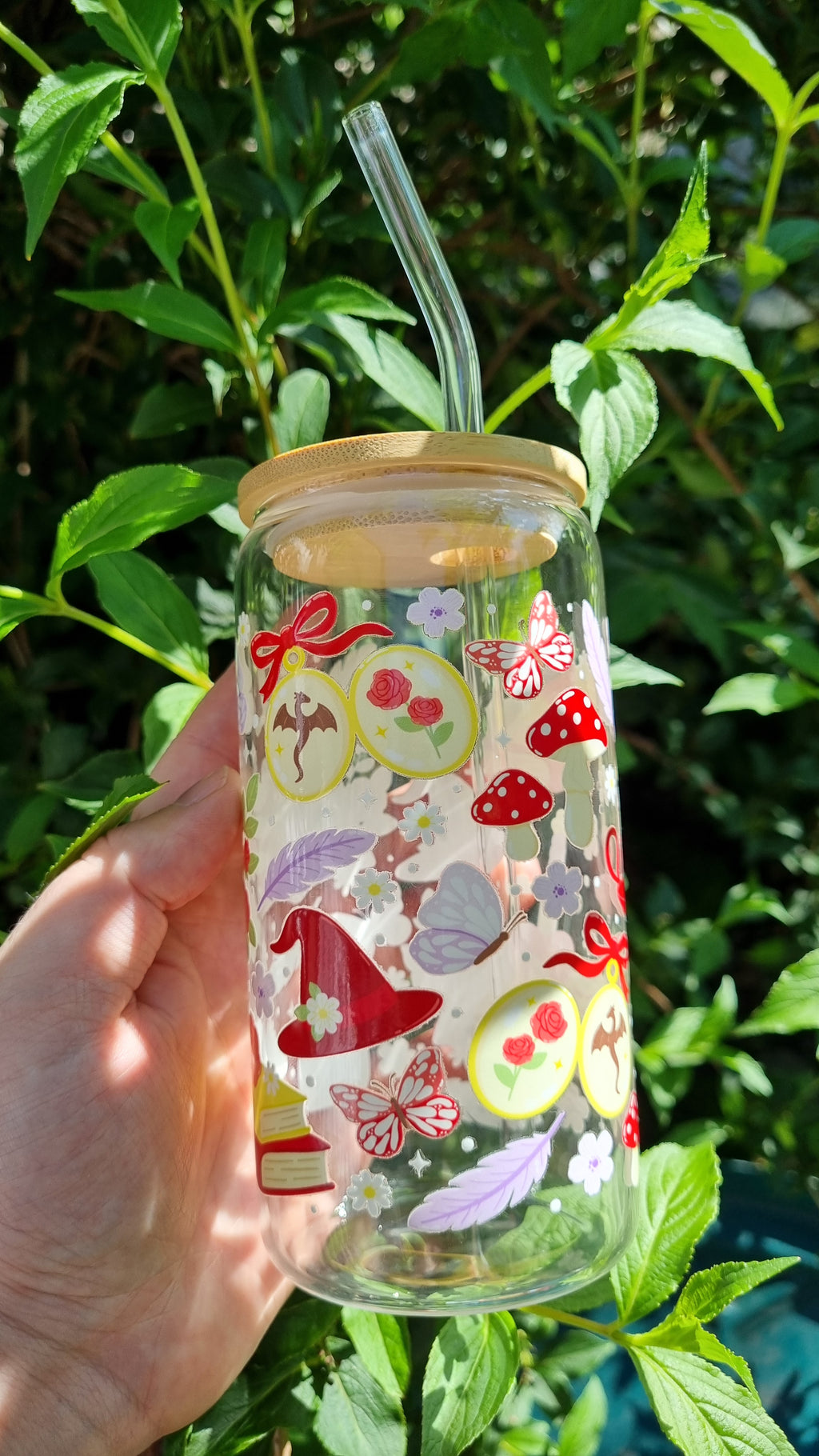 Sublimely Special fantasy romance bookish tumbler with whimsical mushroom and butterfly designs held outdoors
