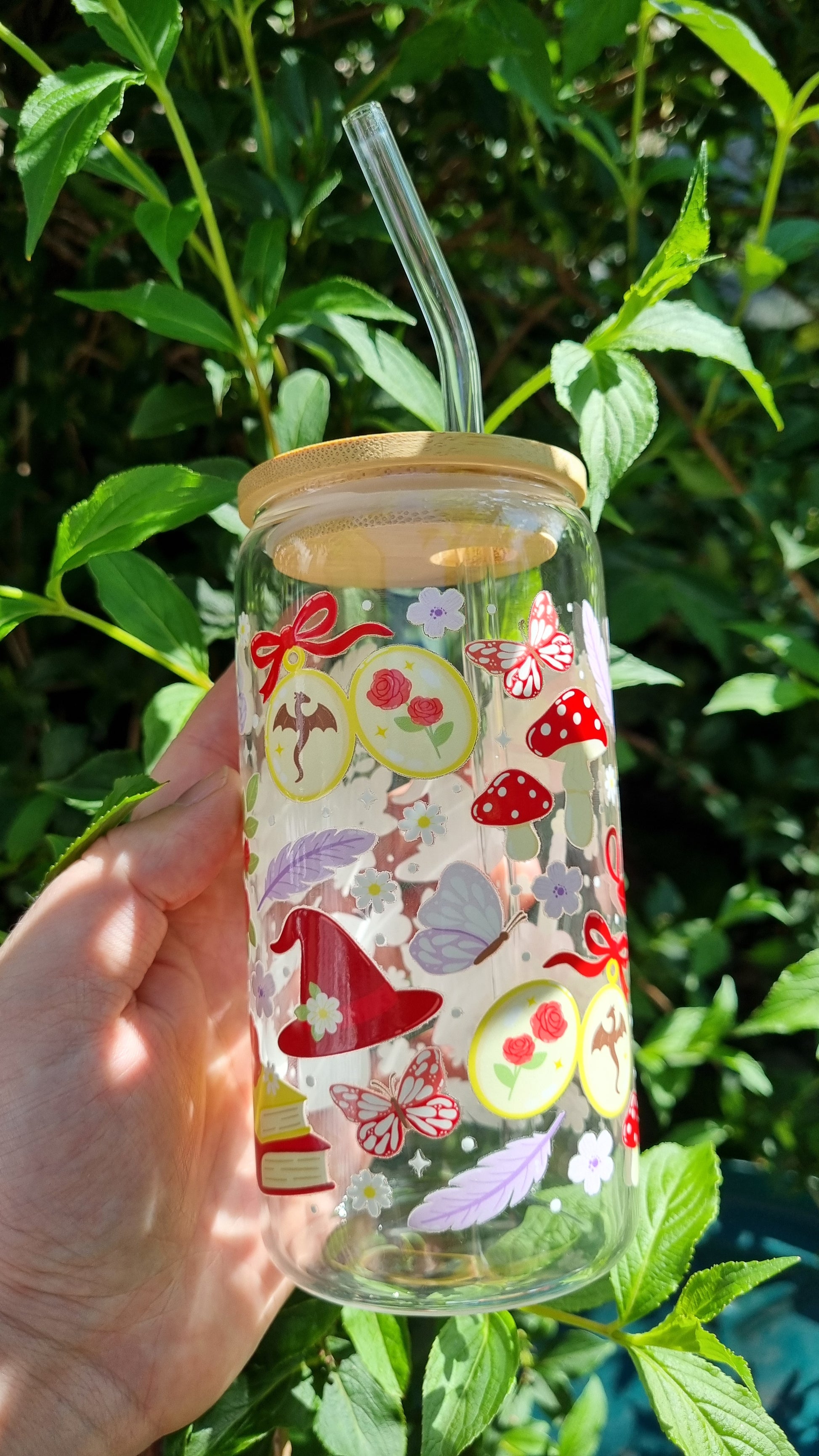 Sublimely Special fantasy romance bookish tumbler with whimsical mushroom and butterfly designs held outdoors
