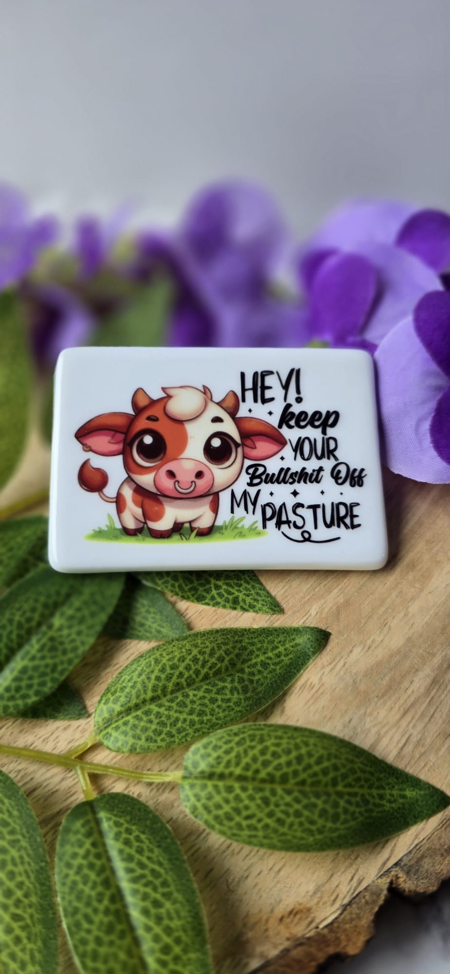 Funny cow fridge magnet with cartoon cow and humorous text on white background by Sublimely Special