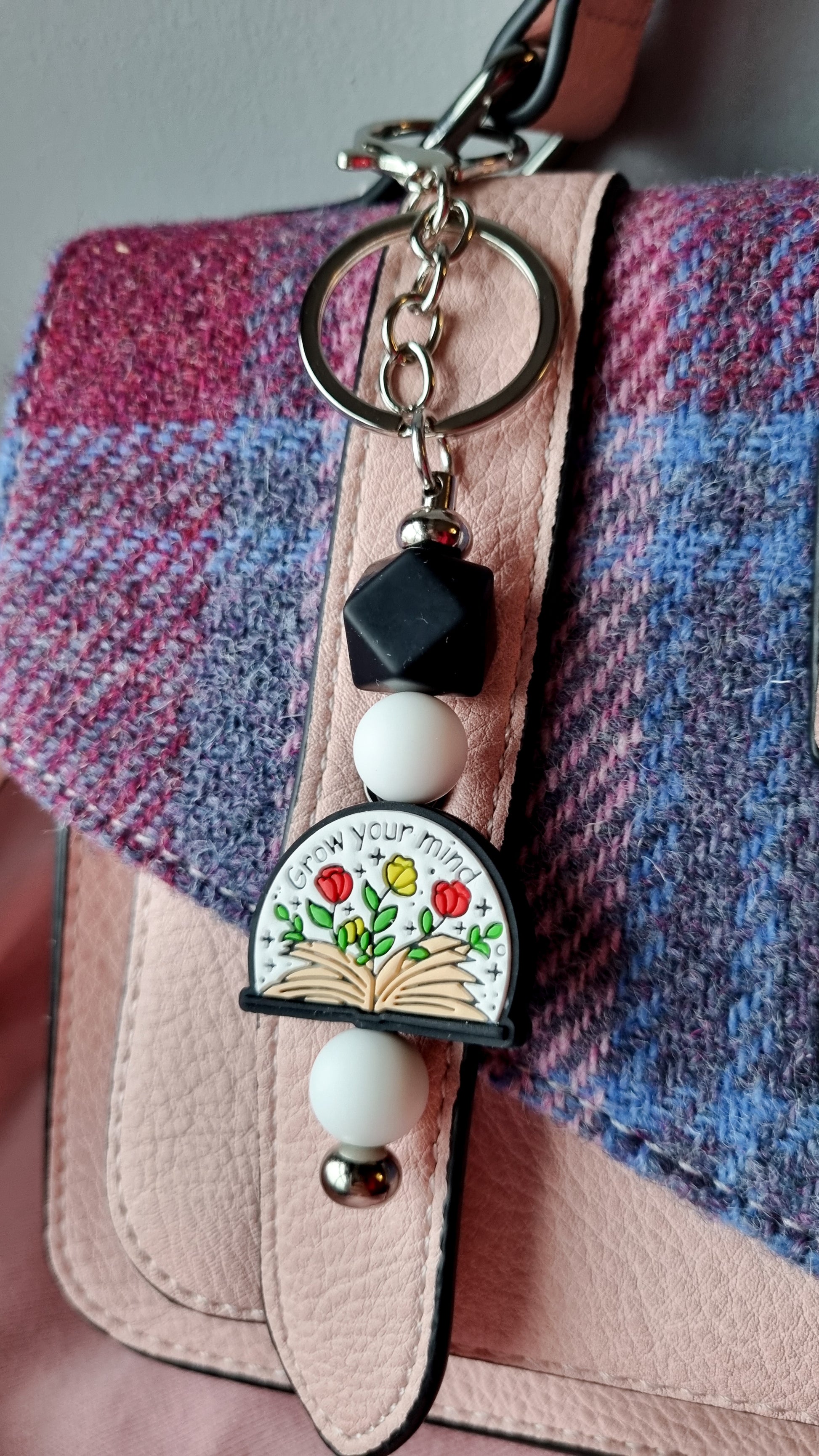 Sublimely Special grow your mind keychain with colourful flowers and beads hanging from a handbag strap