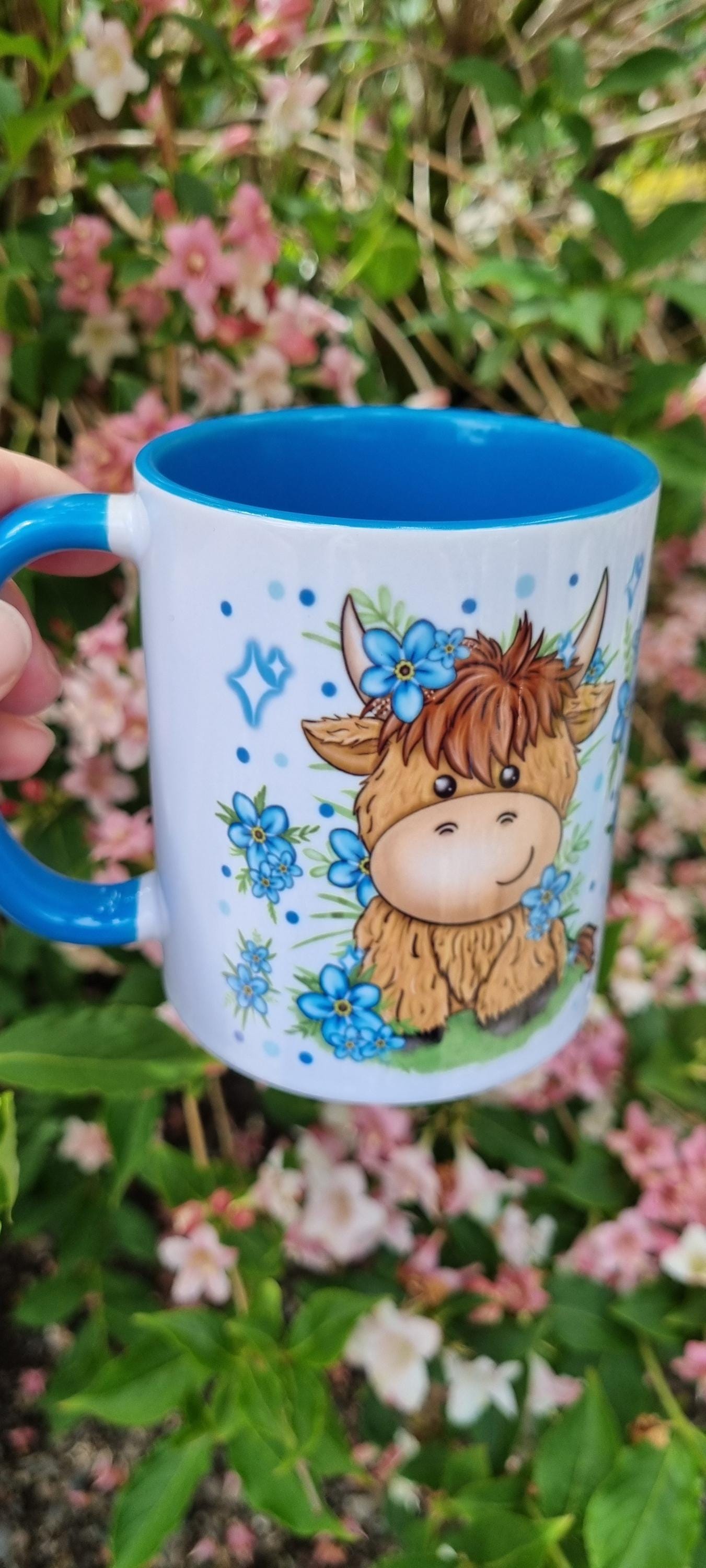 Cute highland cow mug with blue flowers design perfect highland cow gift for animal lovers