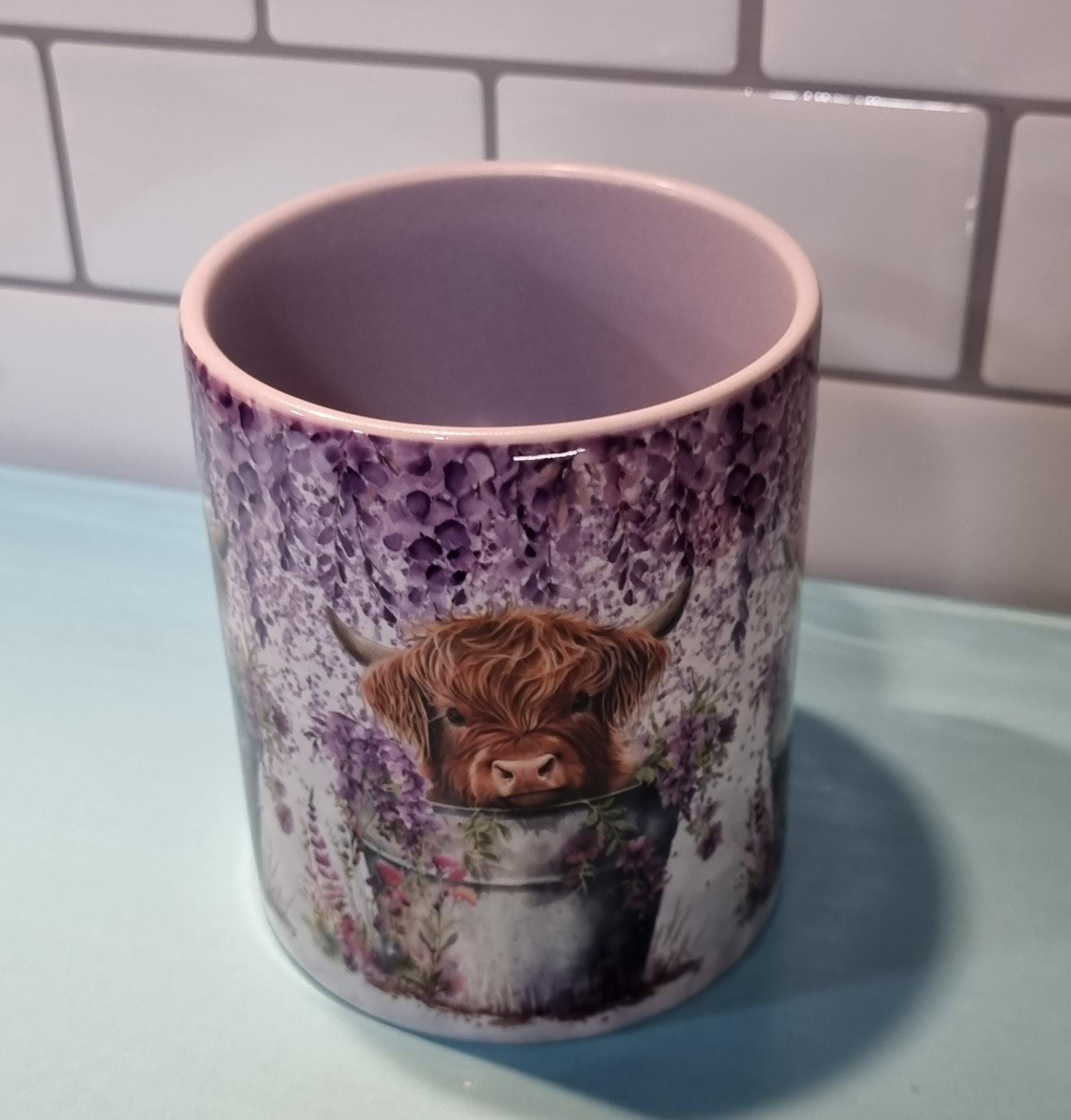 Lilac highland cow mug with floral design and lilac interior from My Store