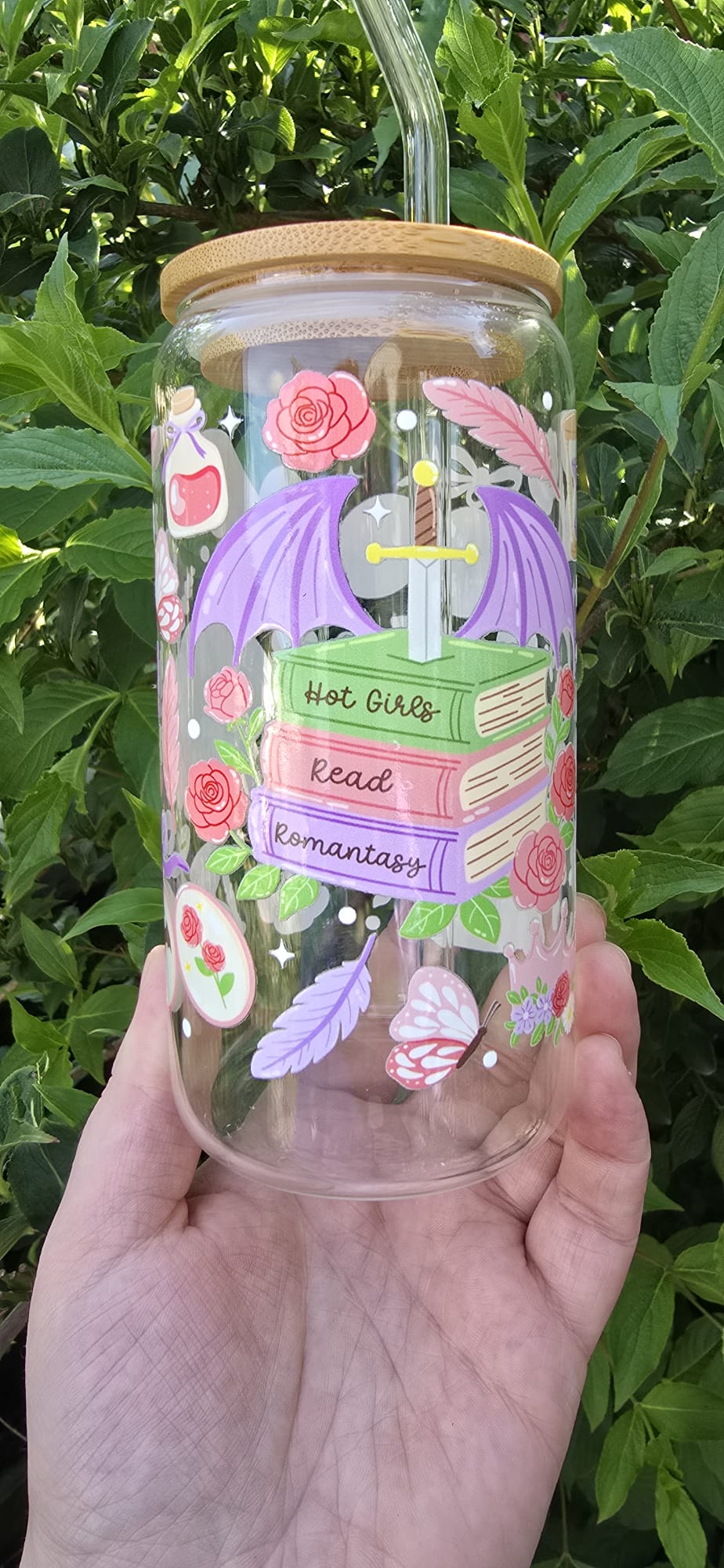 Sublimely Special romantasy book lover tumbler with stacked books, purple dragon wings, and floral designs