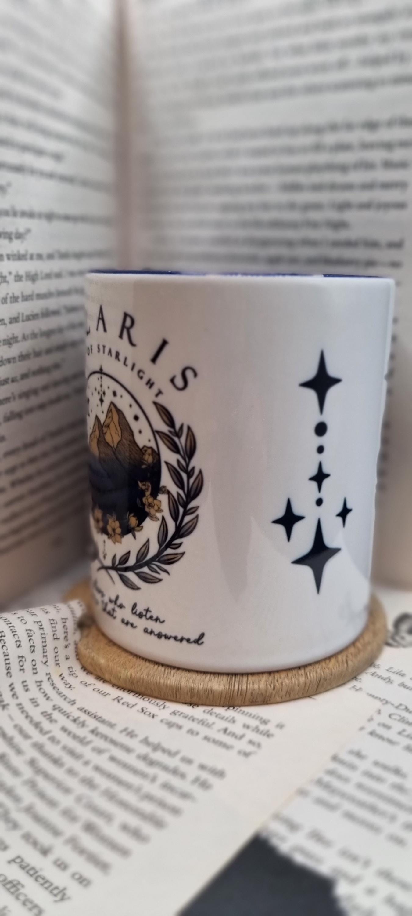 Velaris City of Starlight mug with mountain and star design on white ceramic cup
