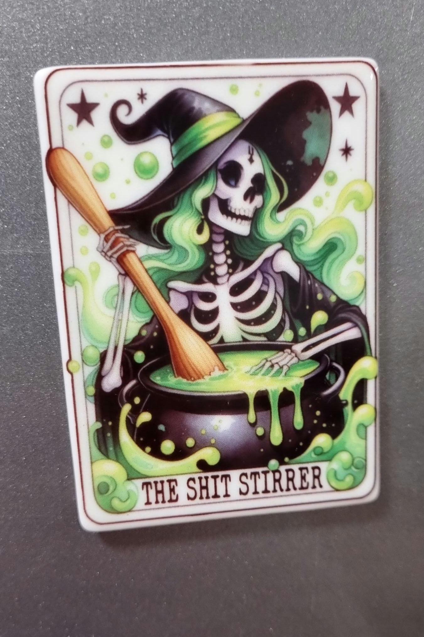 Witchy tarot fridge magnet featuring a skeleton witch stirring a cauldron with green potion