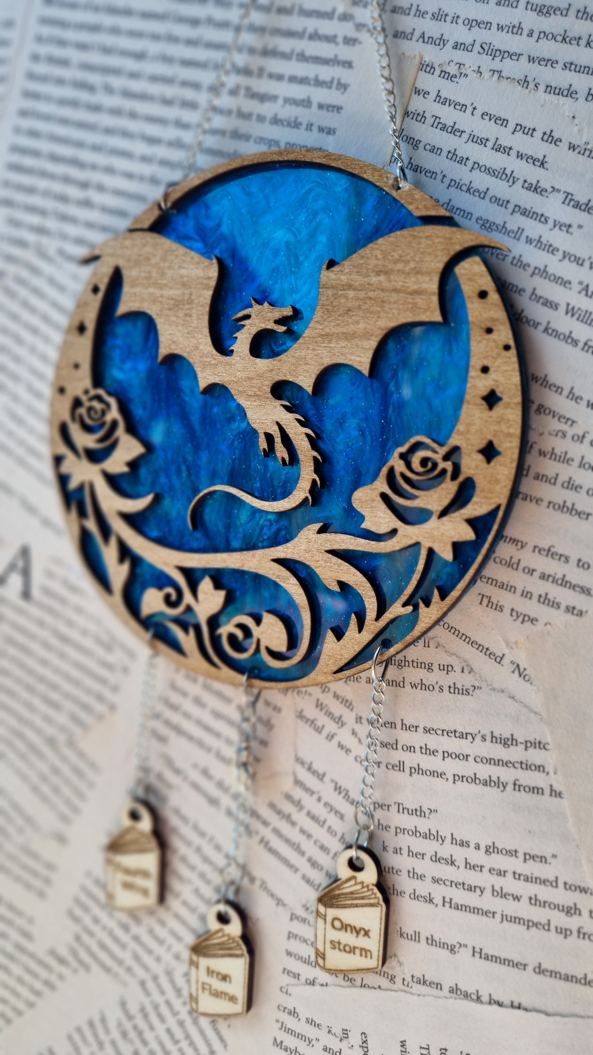 Wooden Fourth Wing inspired ornament featuring a dragon and floral design with dangling name tags